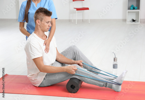 Physiotherapist working wit...