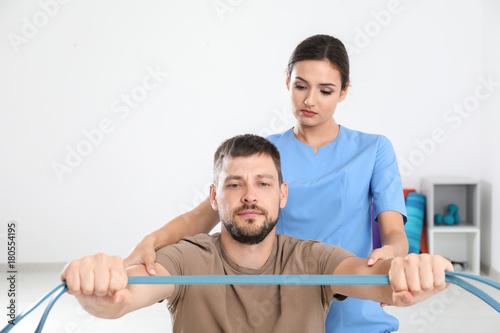 Physiotherapist working wit...