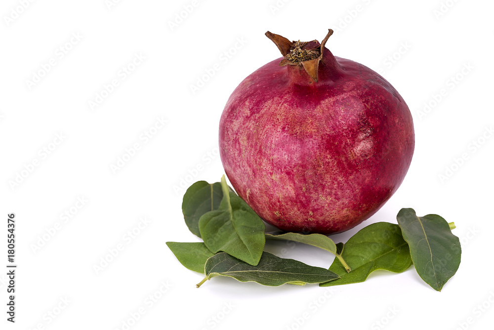 Pomegranate isolated on the white surface Pomegranate isolated on the white surface