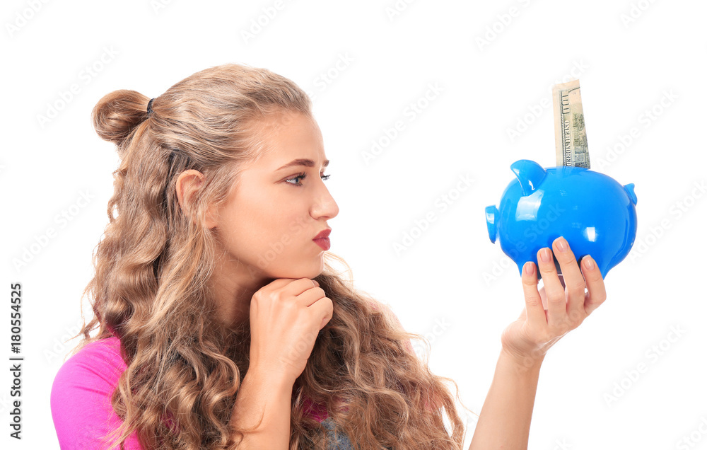 Young woman holding piggy bank on white background Young woman holding piggy bank on white background