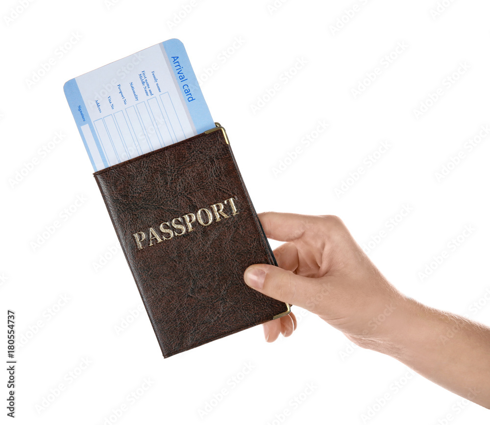 Female tourist holding passport and arrival card on white background Female tourist holding passport and arrival card on white background