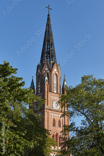 Neogothic red brick church tower in Pori. Finland. Suomi. photo
