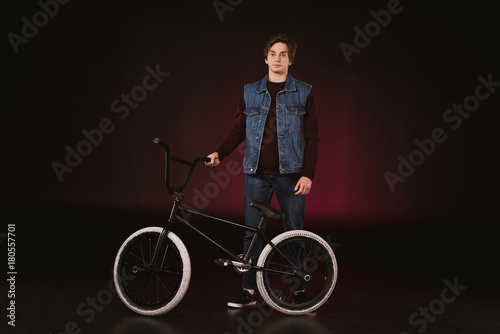 young cyclist with bmx bicycle