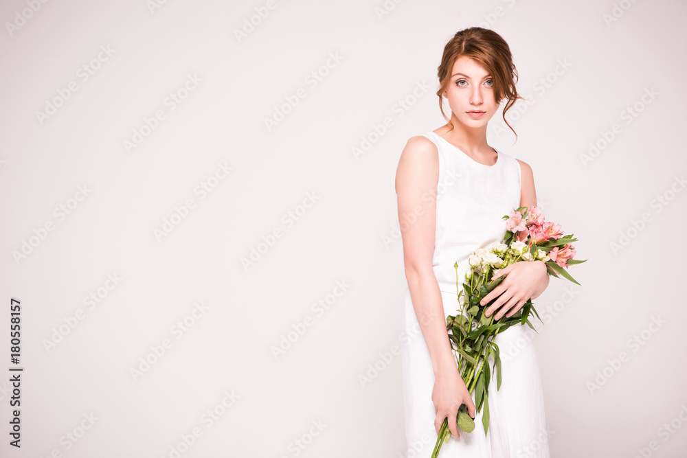 girl in white dress with flowers