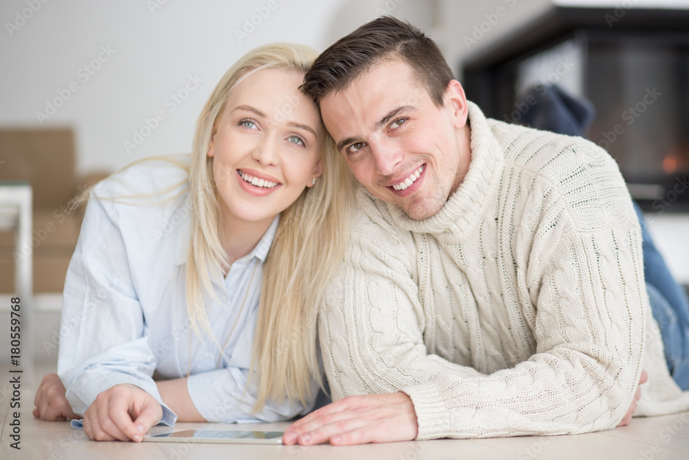 Young Couple using digital tablet on cold winter day Young Couple using digital tablet on cold winter day