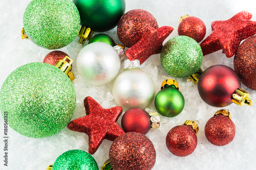 Many Christmas tree balls in the snow