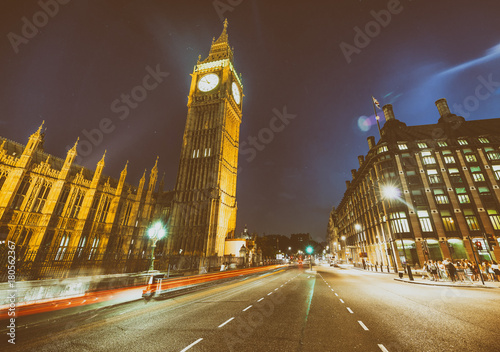 Fototapeta Naklejka Na Ścianę i Meble -  Westminster Palace and Big Ben at night from Westminster Bridge with car light trails - London