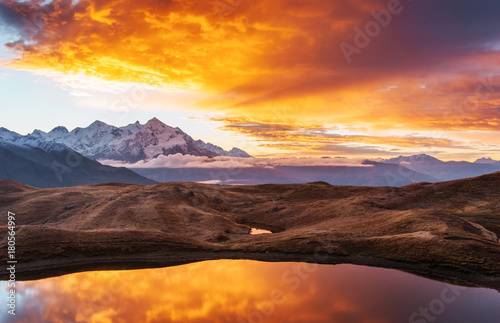 Sunset on mountain lake Koruldi. Upper Svaneti, Georgia, Europe. Caucasus mountains