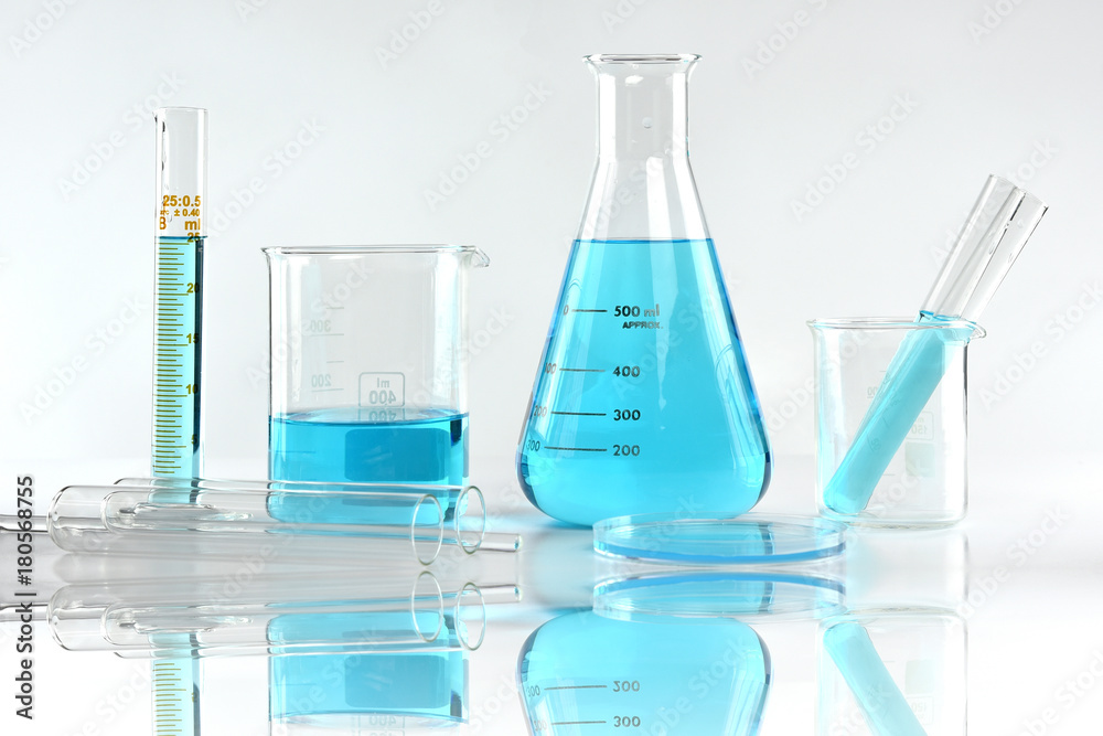 Scientific laboratory experimental glassware with clear solution, Symbolic of science research and development. Scientific laboratory experimental glassware with clear solution, Symbolic of science research and development.