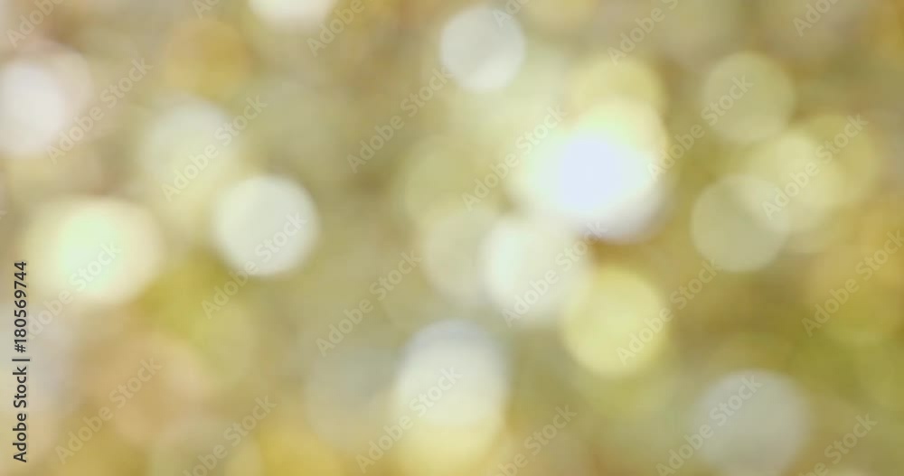 Abstract Christmas background of golden decorations with flares and sparkles Abstract Christmas background of golden decorations with flares and sparkles
