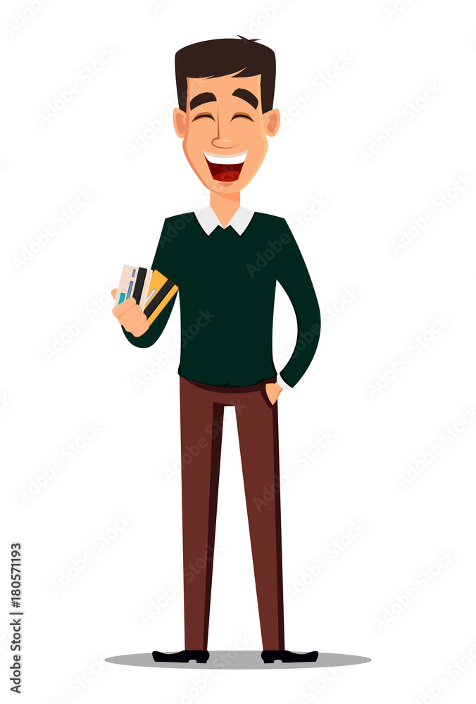 Young handsome smiling businessman in smart casual clothes holding credit cards Young handsome smiling businessman in smart casual clothes holding credit cards