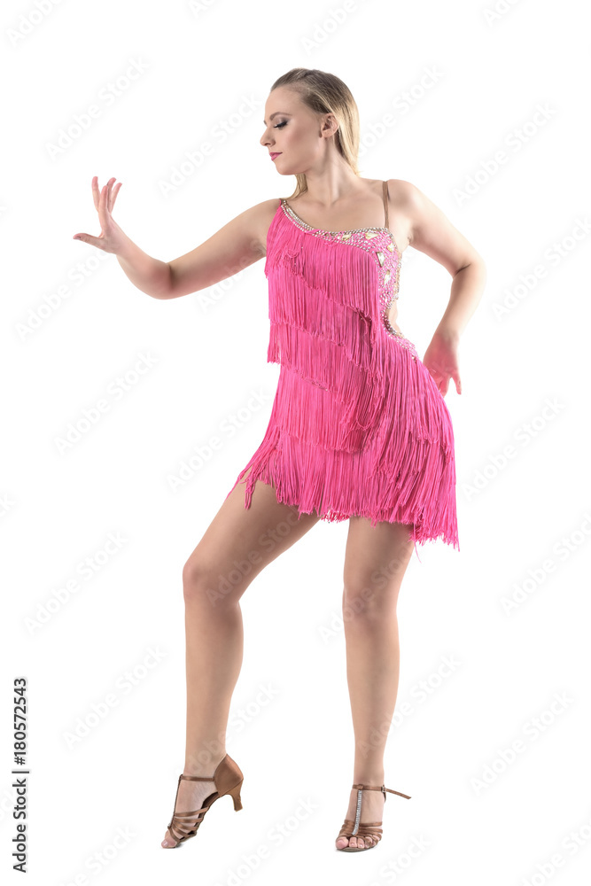 Side view of female Latino dancer in dance move posture. Full body length portrait isolated on white studio background.