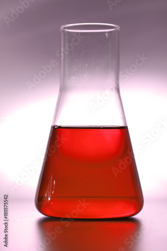Retort for chemical experiments with red liquid
