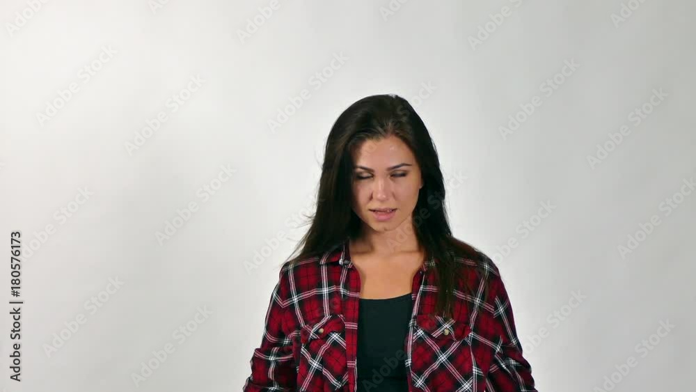 Brunette woman Playing With Her Long Hair And Smiling. Slow Motion Brunette woman Playing With Her Long Hair And Smiling. Slow Motion