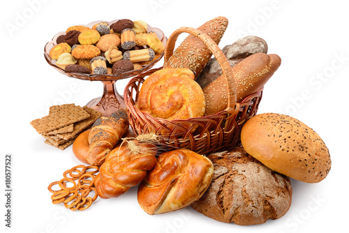 Variety bread products (buns, bread, biscuits, crackers) isolated on white background.