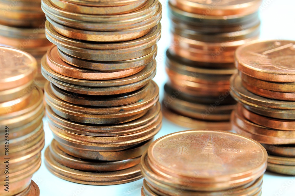 Stack of Eurocent coins on white background. Stack of Eurocent coins on white background.