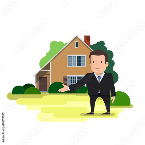 A man is a real estate agent standing in front of the house photo