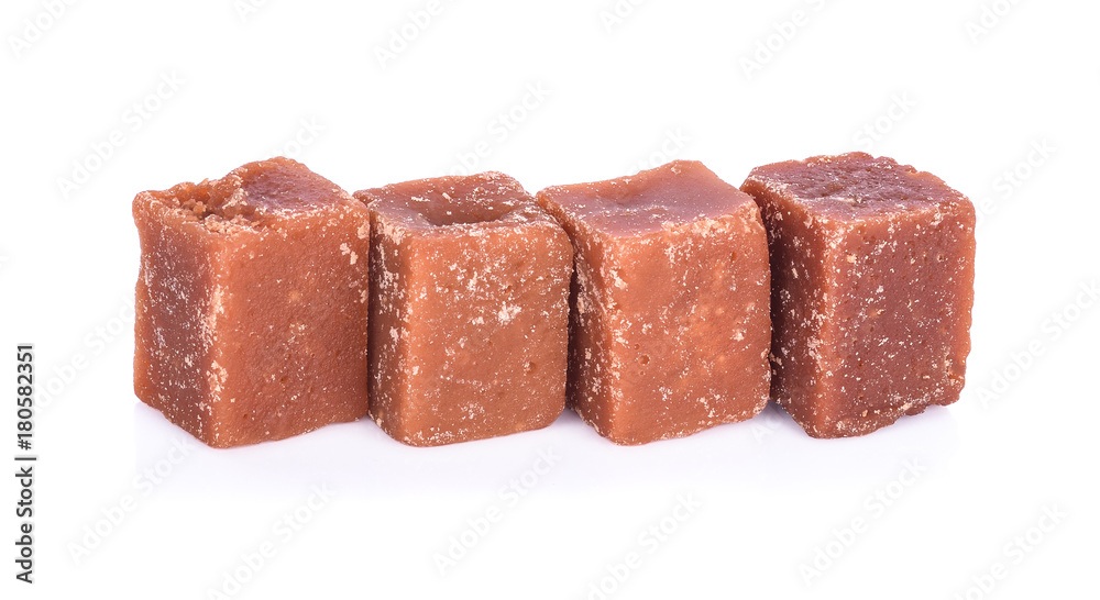 The palm sugar or Jaggery on white background The palm sugar or Jaggery on white background