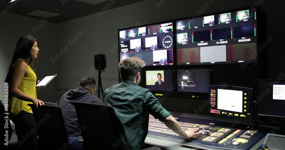 Operators in a control room at a television studio