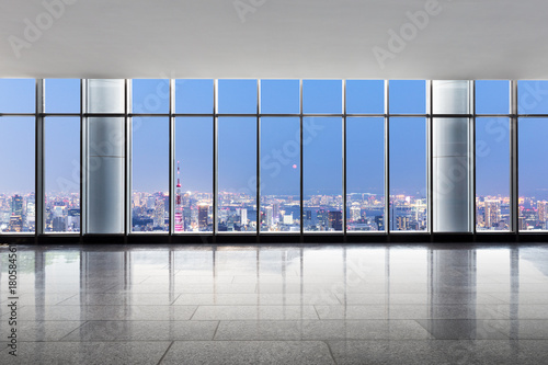 Photography empty office with modern cityscape at twilight