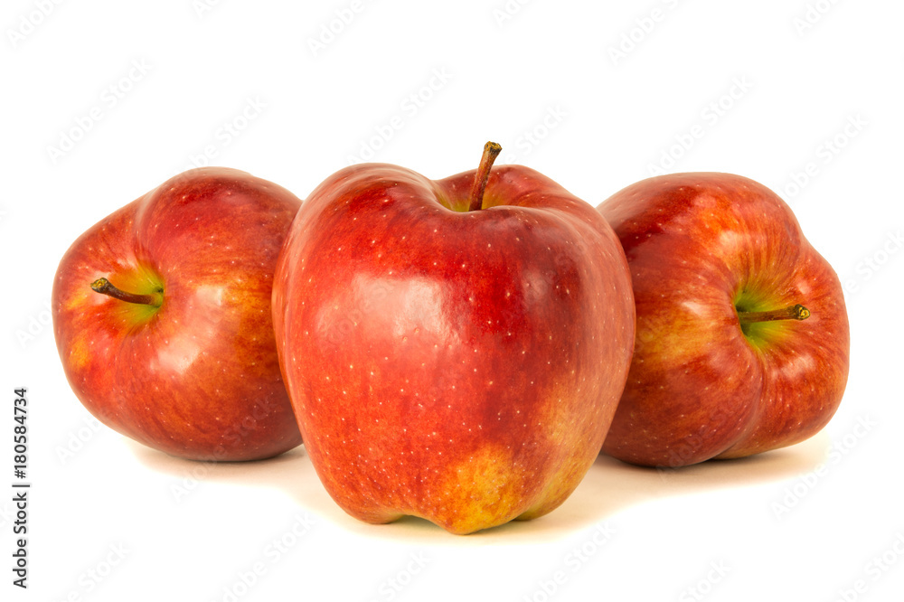red ripe bright apples on a white isolated background red ripe bright apples on a white isolated background
