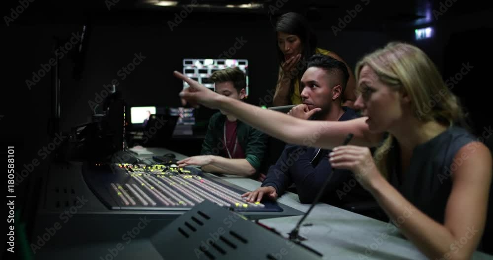 Operators in a control room at a television studio