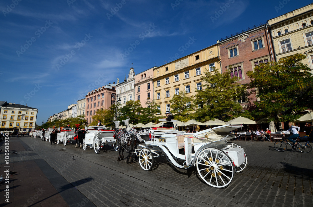 Cab on the main square - old town in Krakow, Poland