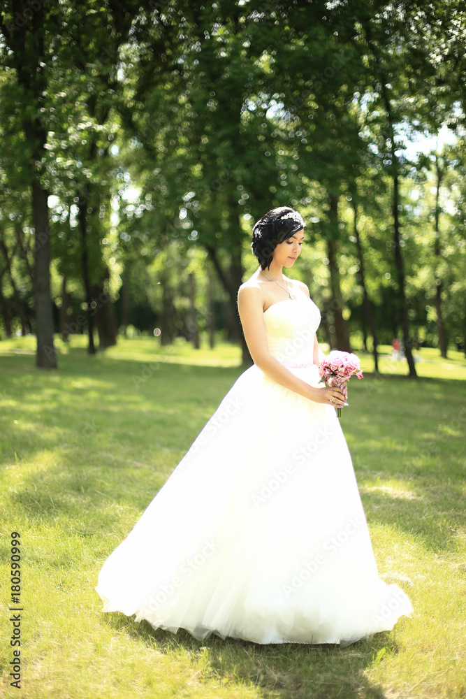 in full growth. pensive bride with bouquet in full growth. pensive bride with bouquet