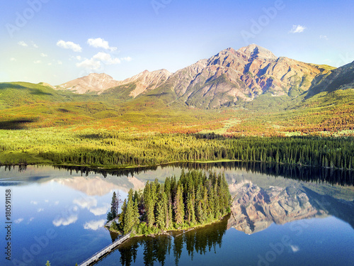 Pyramid Island and beautiful reflection of surrounding mountains in the lake  Canada