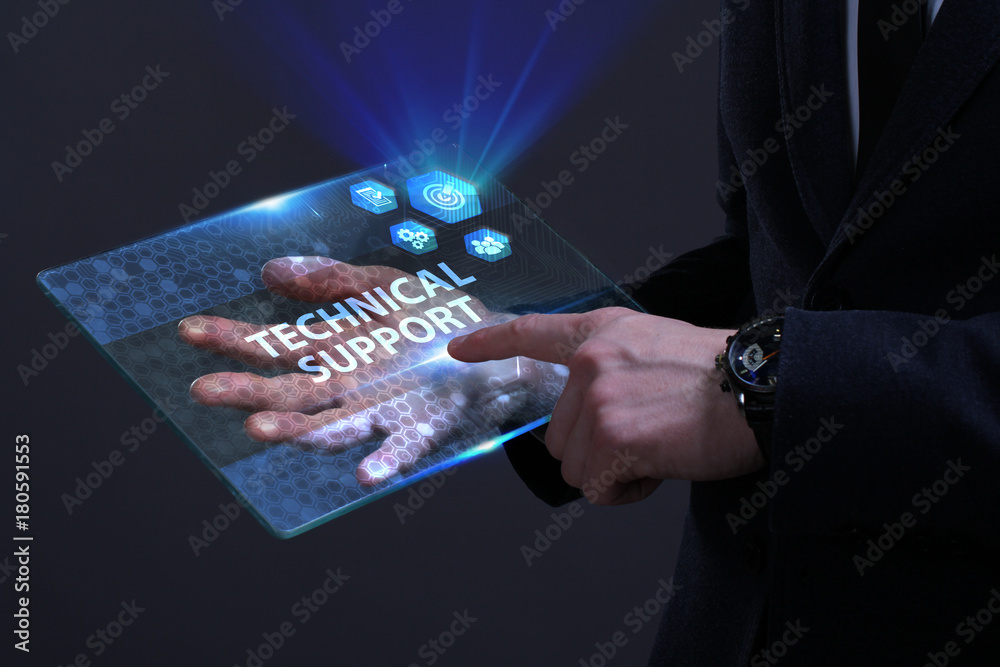 Business, Technology, Internet and network concept. Young businessman working on a virtual screen of the future and sees the inscription: Technical support Business, Technology, Internet and network concept. Young businessman working on a virtual screen of the future and sees the inscription: Technical support