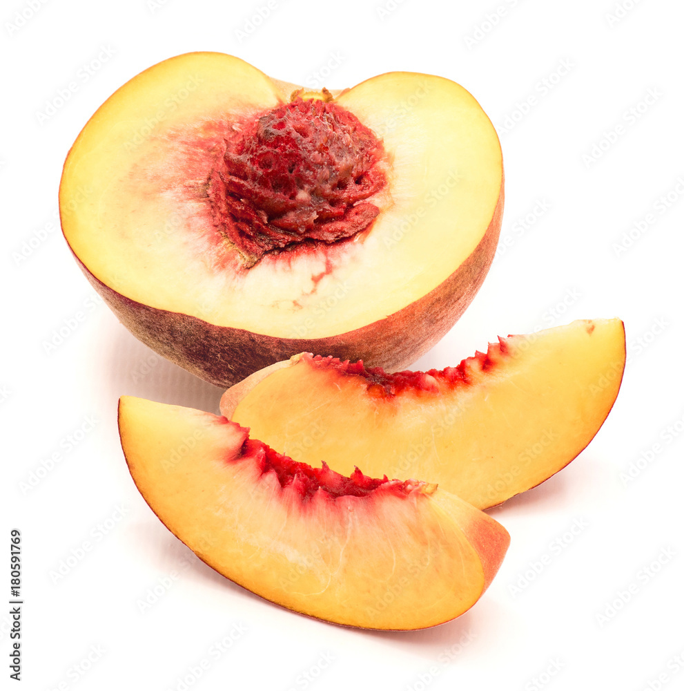 One half with a stone and two peach slices isolated on white background.