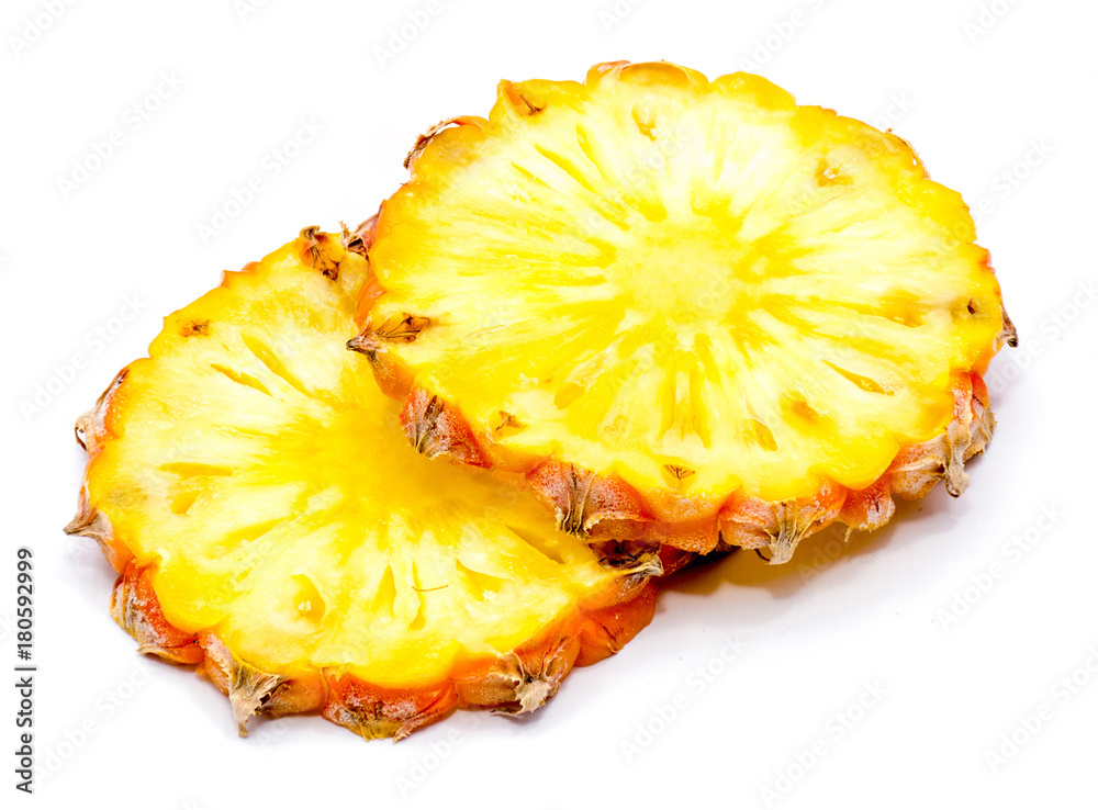 Two fresh round pineapple slices isolated on white background. Two fresh round pineapple slices isolated on white background.