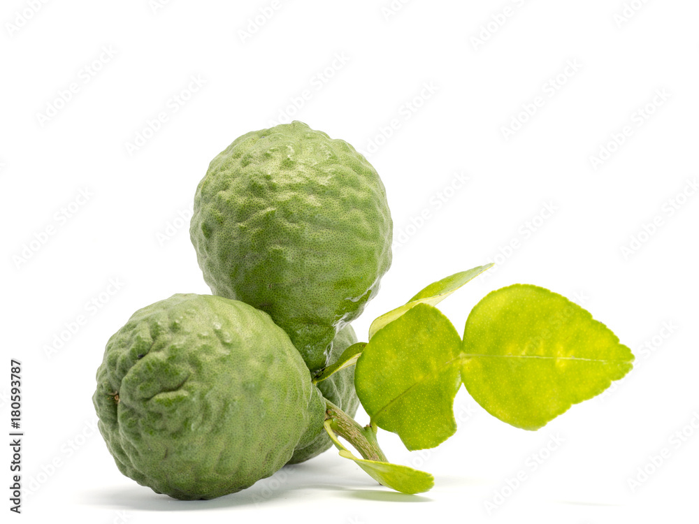 close up group of fresh bergamot with green leaves isolated on white background. benefits of bergamot for beauty and health concept close up group of fresh bergamot with green leaves isolated on white background. benefits of bergamot for beauty and health concept