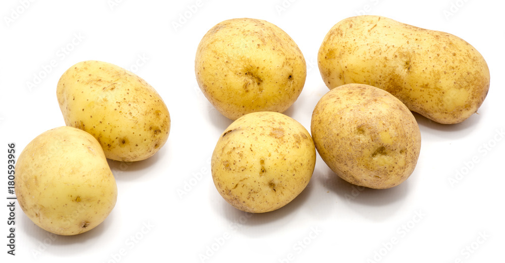 Group of several whole potatoes isolated on white background. Group of several whole potatoes isolated on white background.