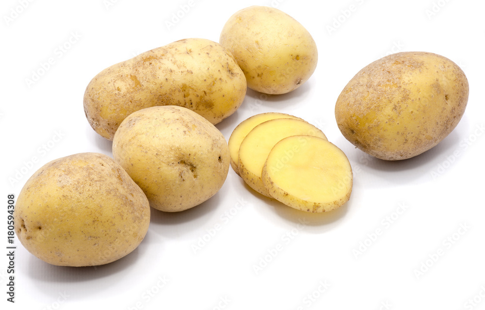 Group of whole potatoes with slices isolated on white background. Group of whole potatoes with slices isolated on white background.