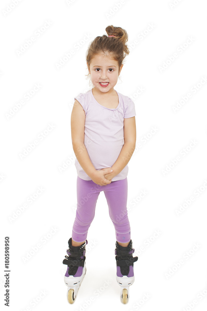 Little pretty girl riding a roller. Isolated on white background Little pretty girl riding a roller. Isolated on white background
