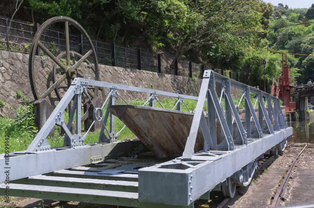 Boat on the river bank.A boat on a cradle at Keage boat bank of Lake Biwa Canal, Kyoto, Japan. Boat on the river bank.A boat on a cradle at Keage boat bank of Lake Biwa Canal, Kyoto, Japan.