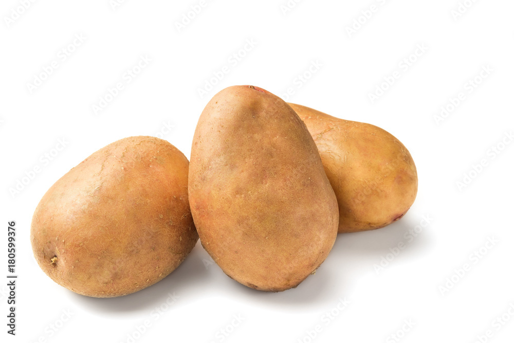 Uncooked, unpeeled, fresh whole potatoes isolated on white background Uncooked, unpeeled, fresh whole potatoes isolated on white background