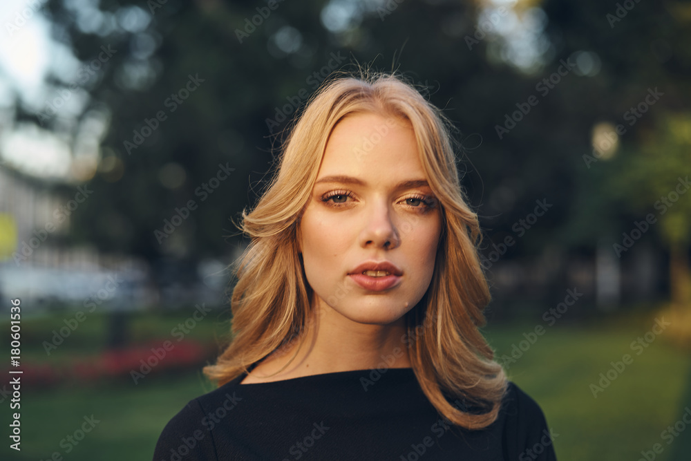 portrait of blonde on nature background