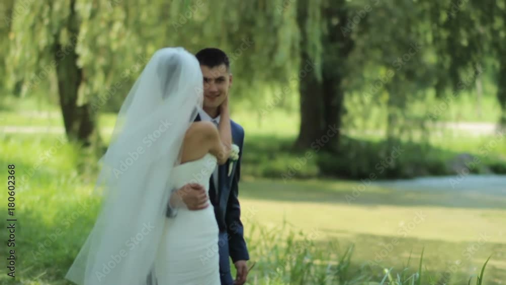 gentle hugs of the newlyweds. young couple in love . beautiful newlyweds gently embrace. tenderness love.