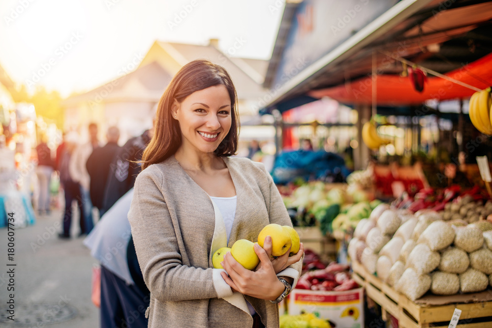 Shopping woman buying fruit at the market. Shopping woman buying fruit at the market.