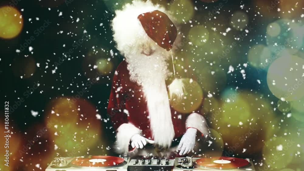 father christmas dancing at a disco party with snow and ice