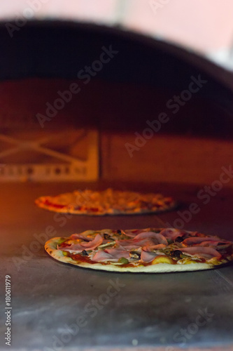Fresh pizza inside the oven...