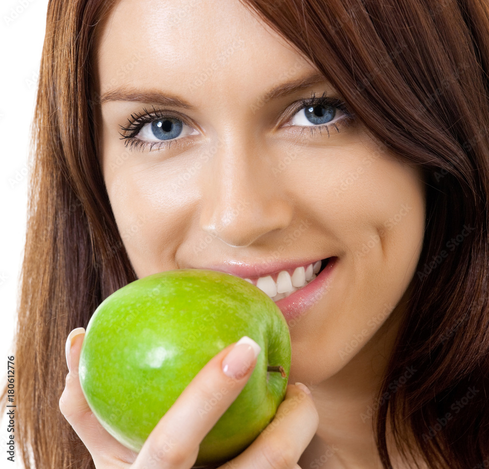 Cheerful woman eating apple, over white Cheerful woman eating apple, over white