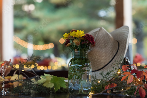 Party decoration with flowers and cowboy hat