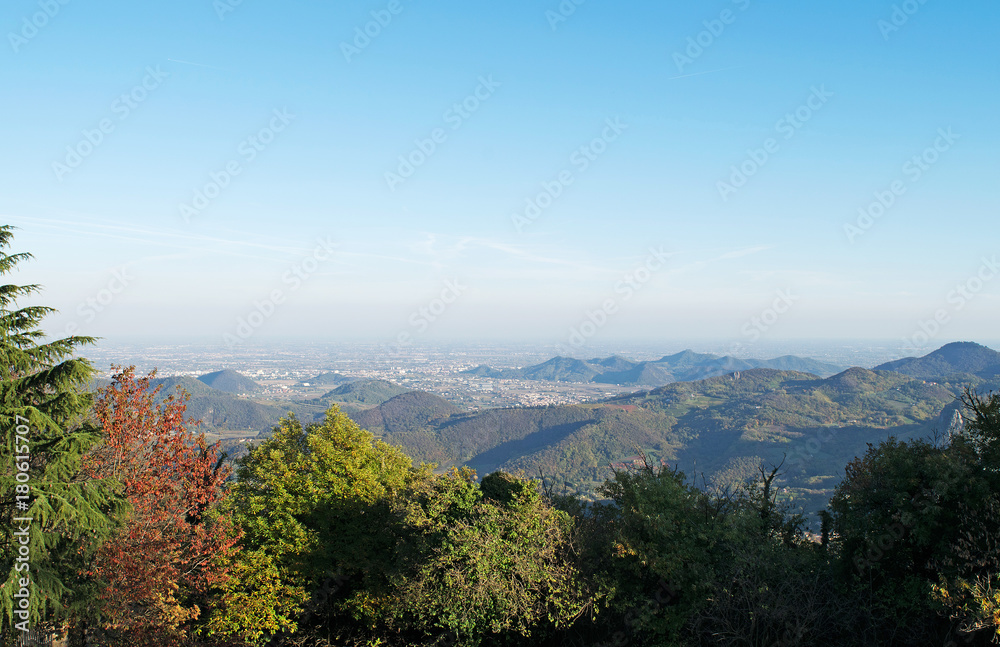 Fototapeta premium Panorama of the Euganean Hills,Italy,05 November 2017,view from the mountain Madonna on the panorama of the Euganean hills,the beginning of November,in the distance a bluish haze of fog