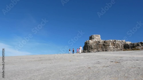 Family walking near ruins