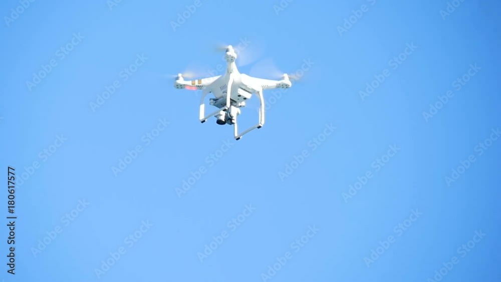 Drone being used to film beautiful Palm trees against a tropical summer sky Drone being used to film beautiful Palm trees against a tropical summer sky