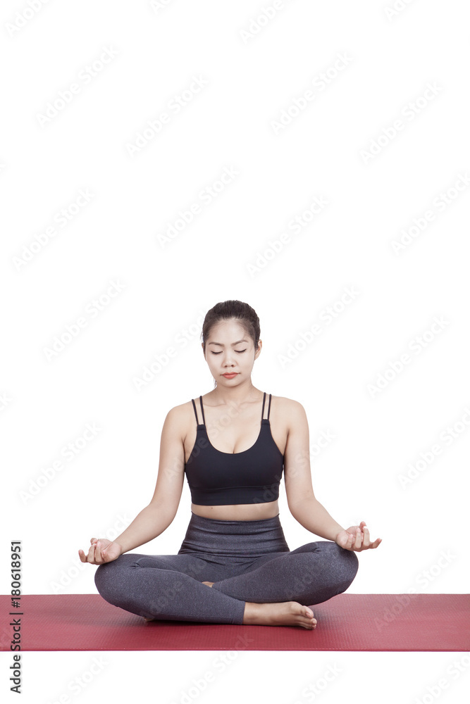 Portrait of young asian woman exercise playing yoga isolated white background