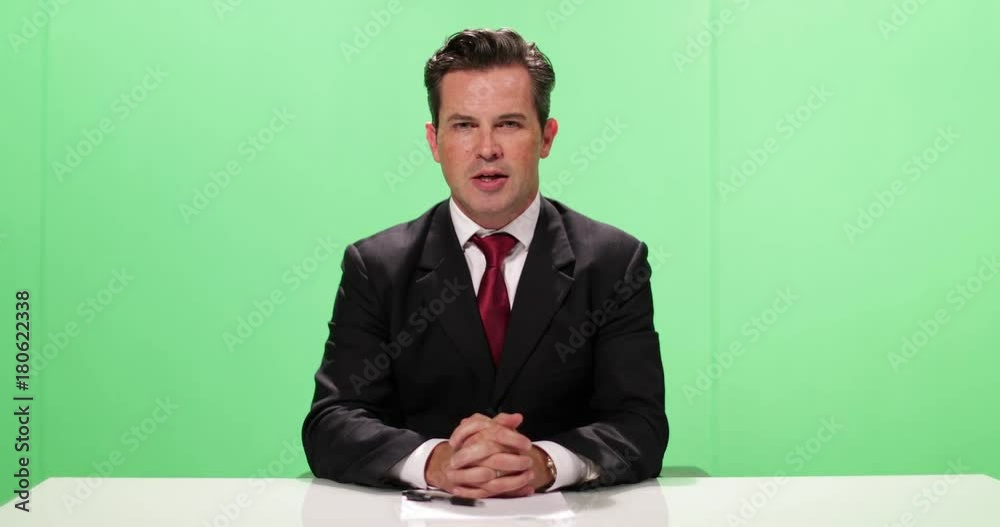 Presenter in a green screen studio